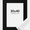 Ramme Abisko Hvid 30x40 cm - Passepartout Sort 21x29,7 cm (A4)